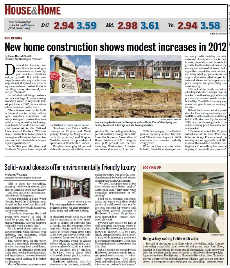 a newspaper with pictures of a house