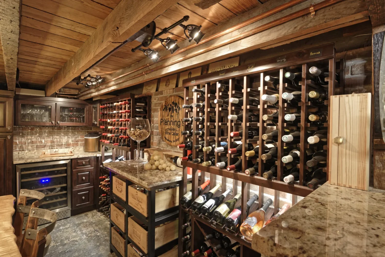 a wine cellar with wine bottles and wine glasses