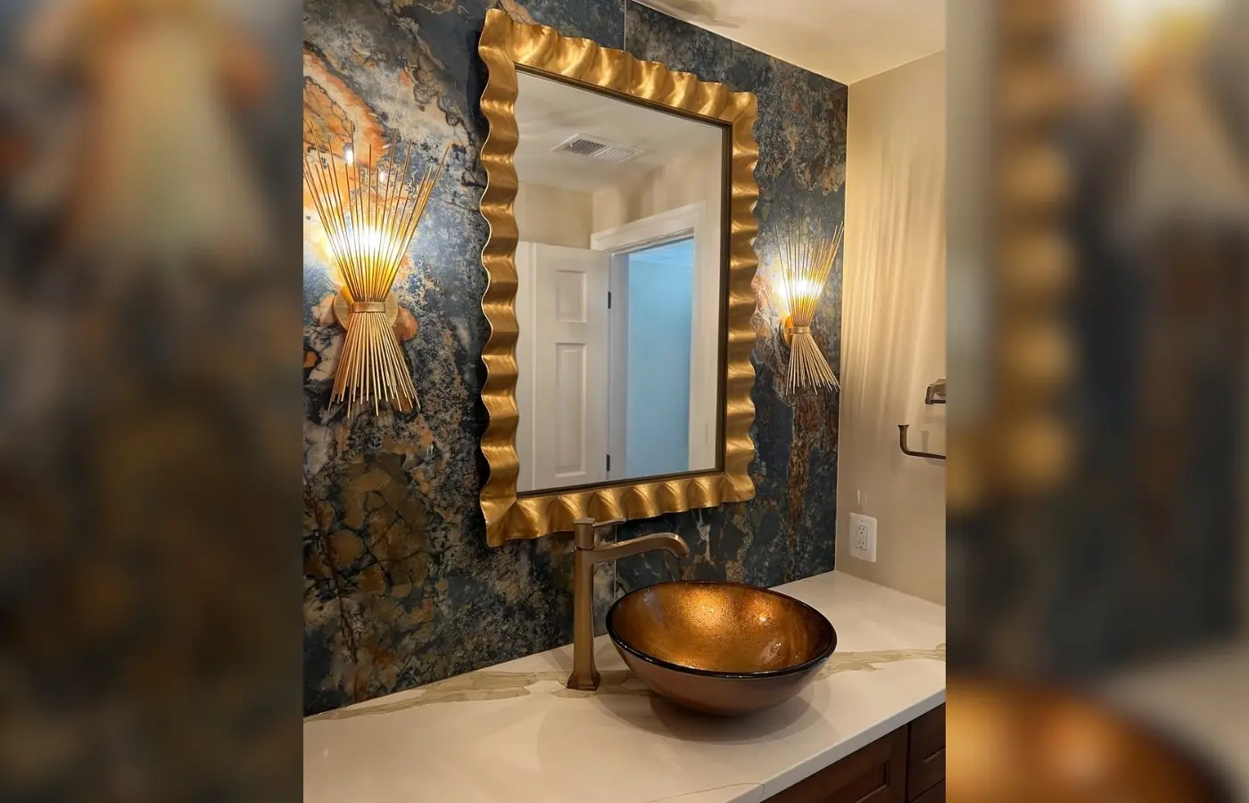 a mirror above a sink