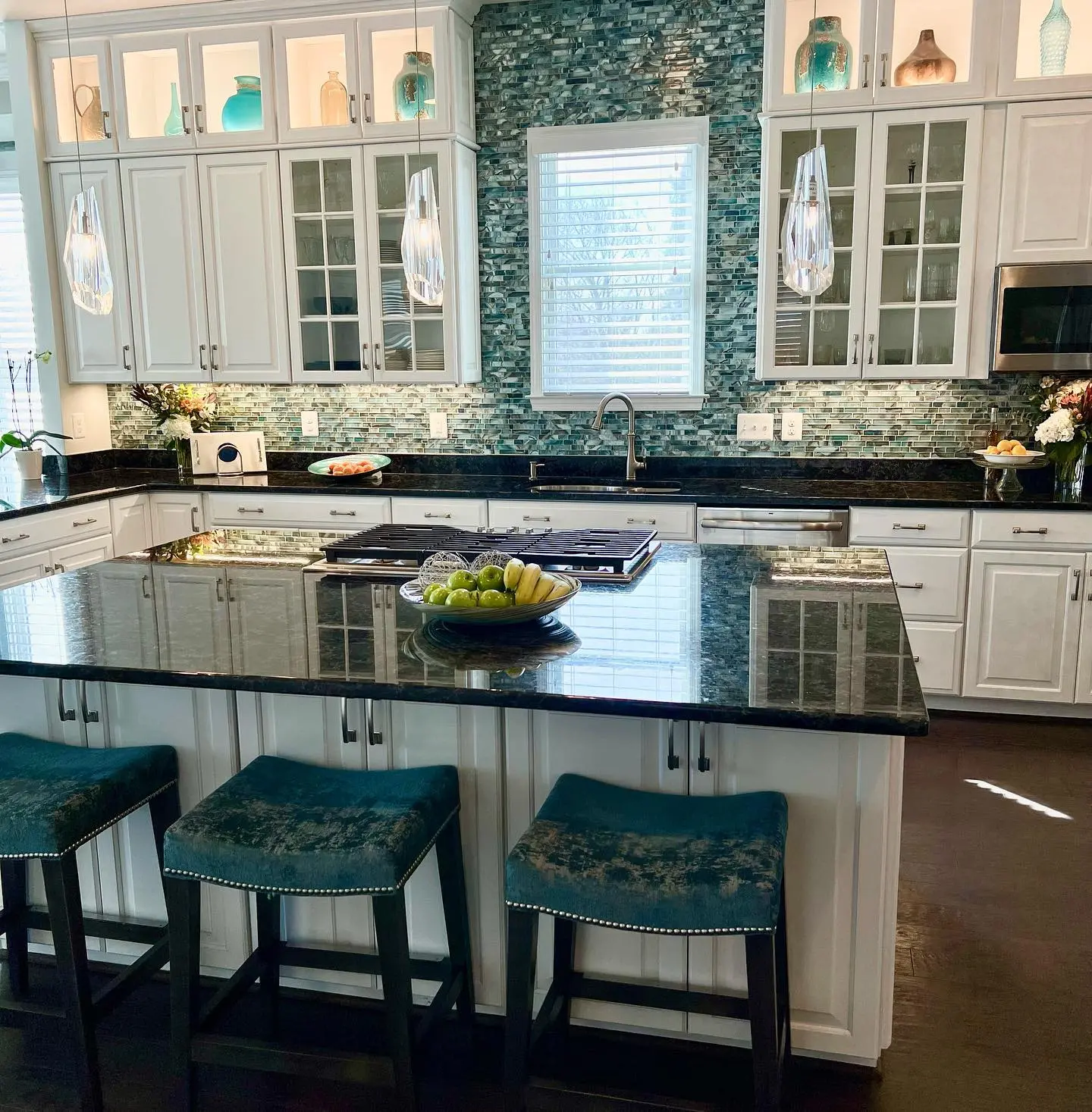Northern Virginia Kitchen Remodeling 1 | Award Winning Interior Designers Washington Dc &Amp; Northern Virginia Areas a kitchen with a black countertop and blue stools