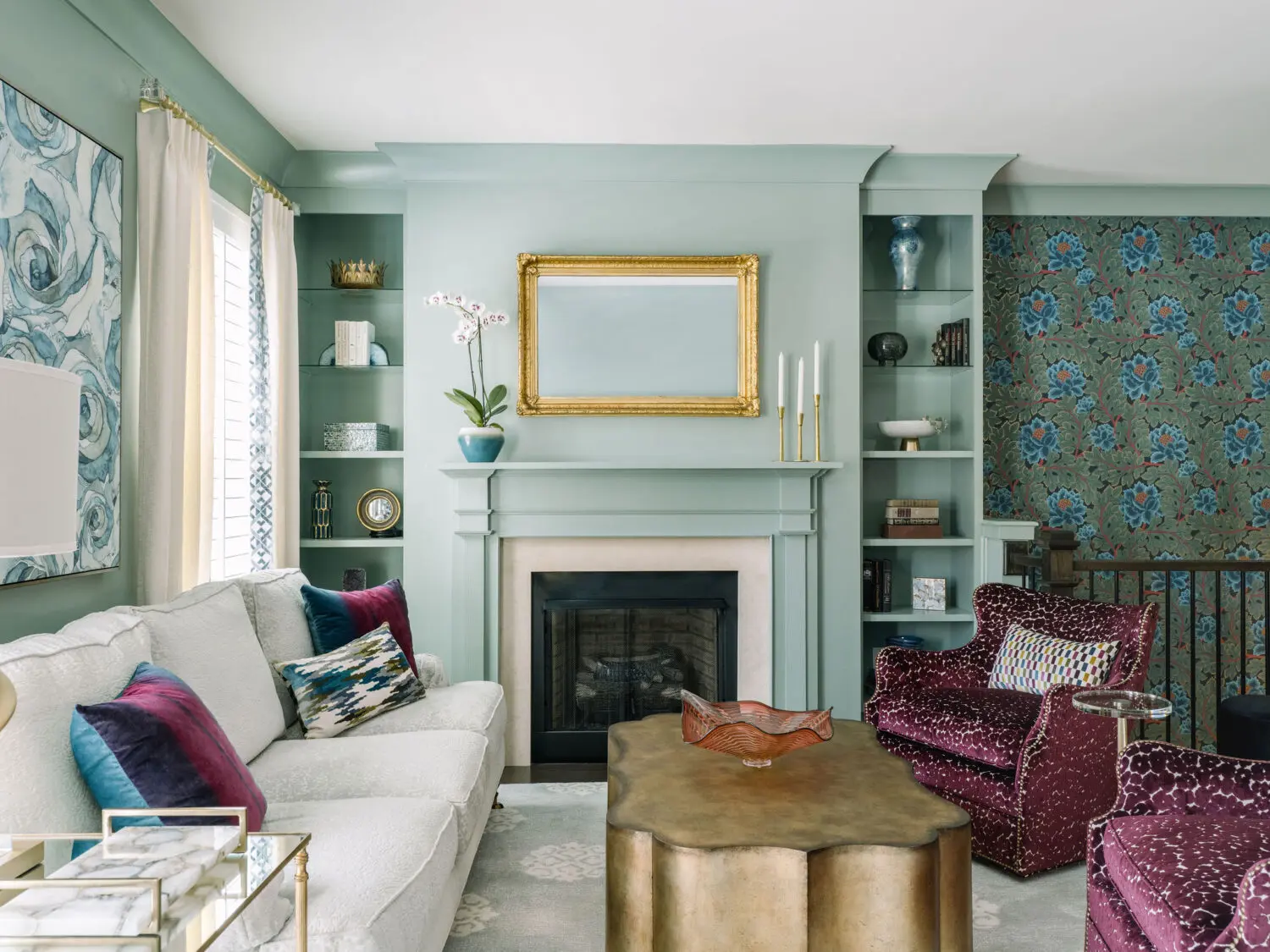 a living room with a fireplace and a couch